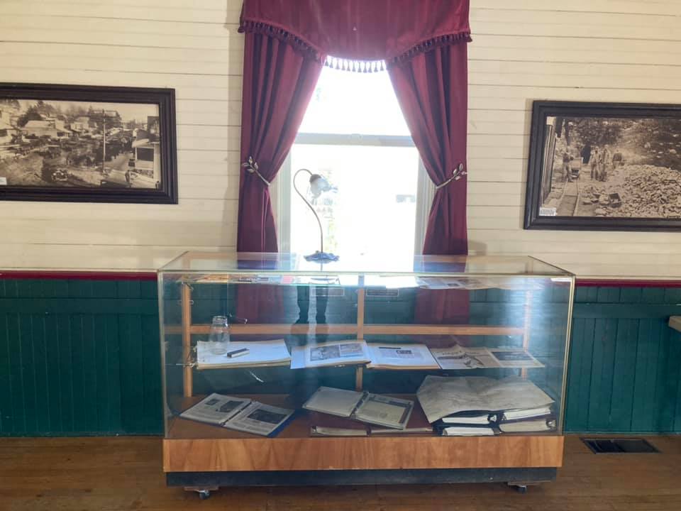 Display case in the town hall with local history displayed it it photo